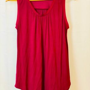 LOFT SLEEVELESS TSHIRT TYPE MATERIAL. NEVER WORN.